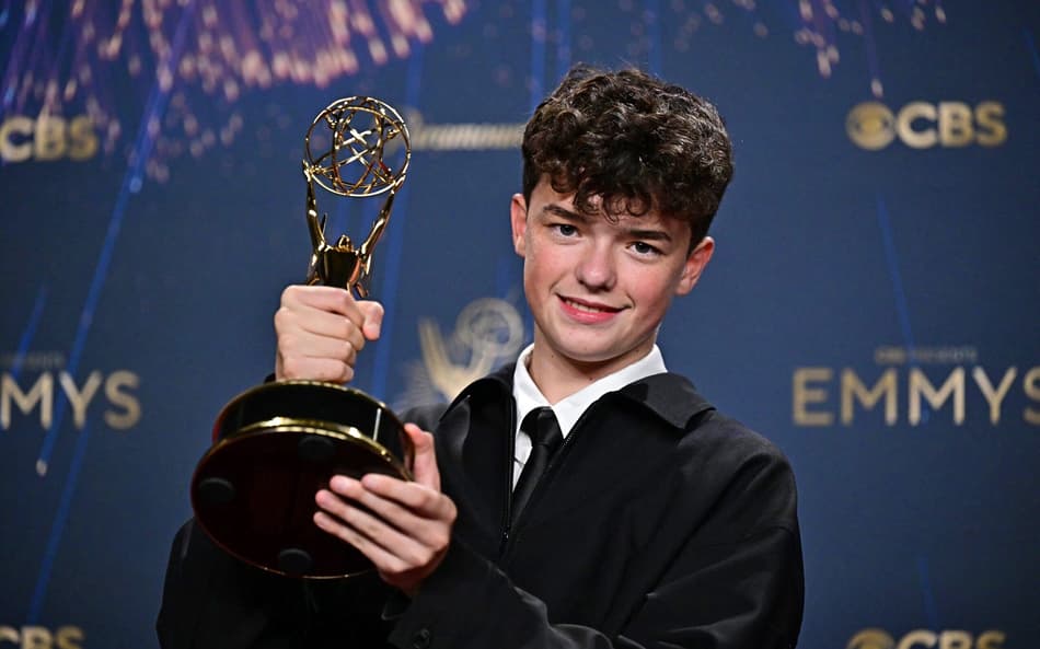 British actor Owen Cooper poses in the press room with the award for Outstanding Supporting Actor in a Limited or Anthology Series or Movie for "Adolescence" during the 77th Primetime Emmy Awards at the Peacock Theatre at LA Live in Los Angeles on September 14, 2025. (Photo by Frederic J. Brown / AFP) / RESTRICTED TO EDITORIAL USE