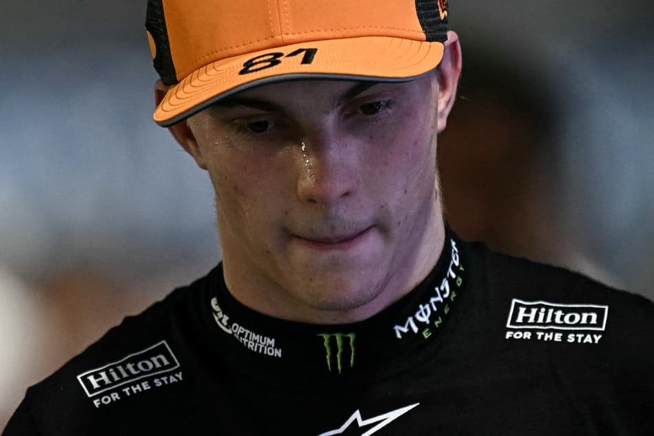 Third-placed McLaren's Australian driver Oscar Piastri looks after the qualifying session for the Formula One Singapore Grand Prix night race at the Marina Bay Street Circuit in Singapore on October 4, 2025. (Photo by Lillian SUWANRUMPHA / AFP)