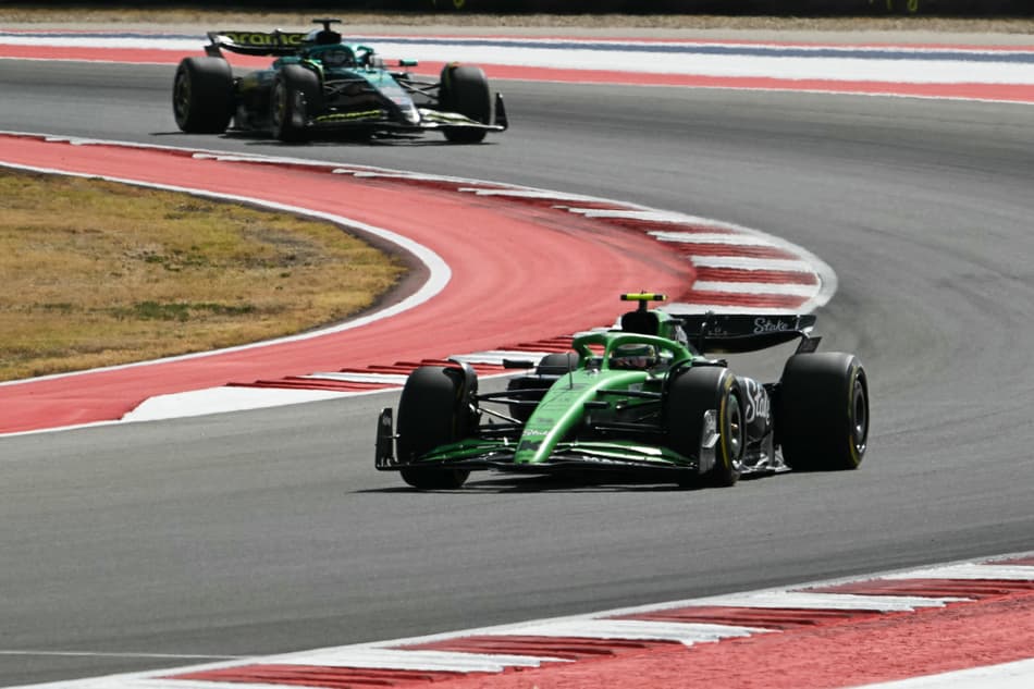 Kick Sauber's Brazilian driver Gabriel Bortoleto races ahead of Aston Martin's Canadian driver Lance Stroll during the United States Formula One Sprint at the Circuit of the Americas in Austin, Texas, on October 18, 2025. (Photo by RONALDO SCHEMIDT / AFP)