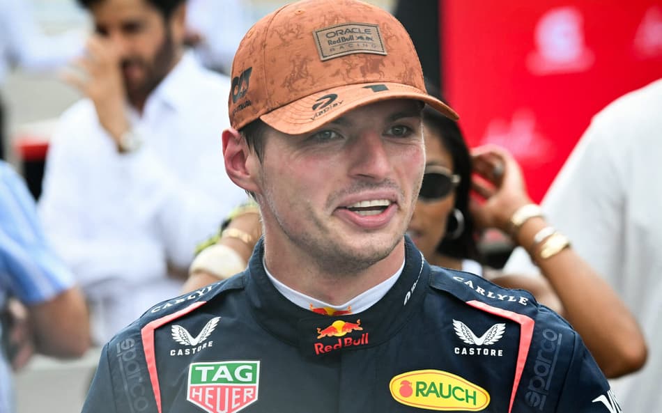 Red Bull Racing's Dutch driver Max Verstappen walks to the podium after winning the United States Formula One Sprint at the Circuit of the Americas in Austin, Texas, on October 18, 2025. (Photo by RONALDO SCHEMIDT / AFP)