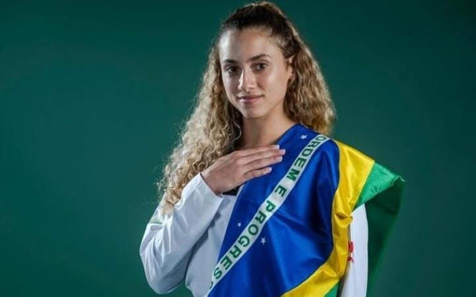 Milena Titoneli leva prata no Mundial de Taekwondo na China (Foto: Reprodução/ Alexandre Loureiro)