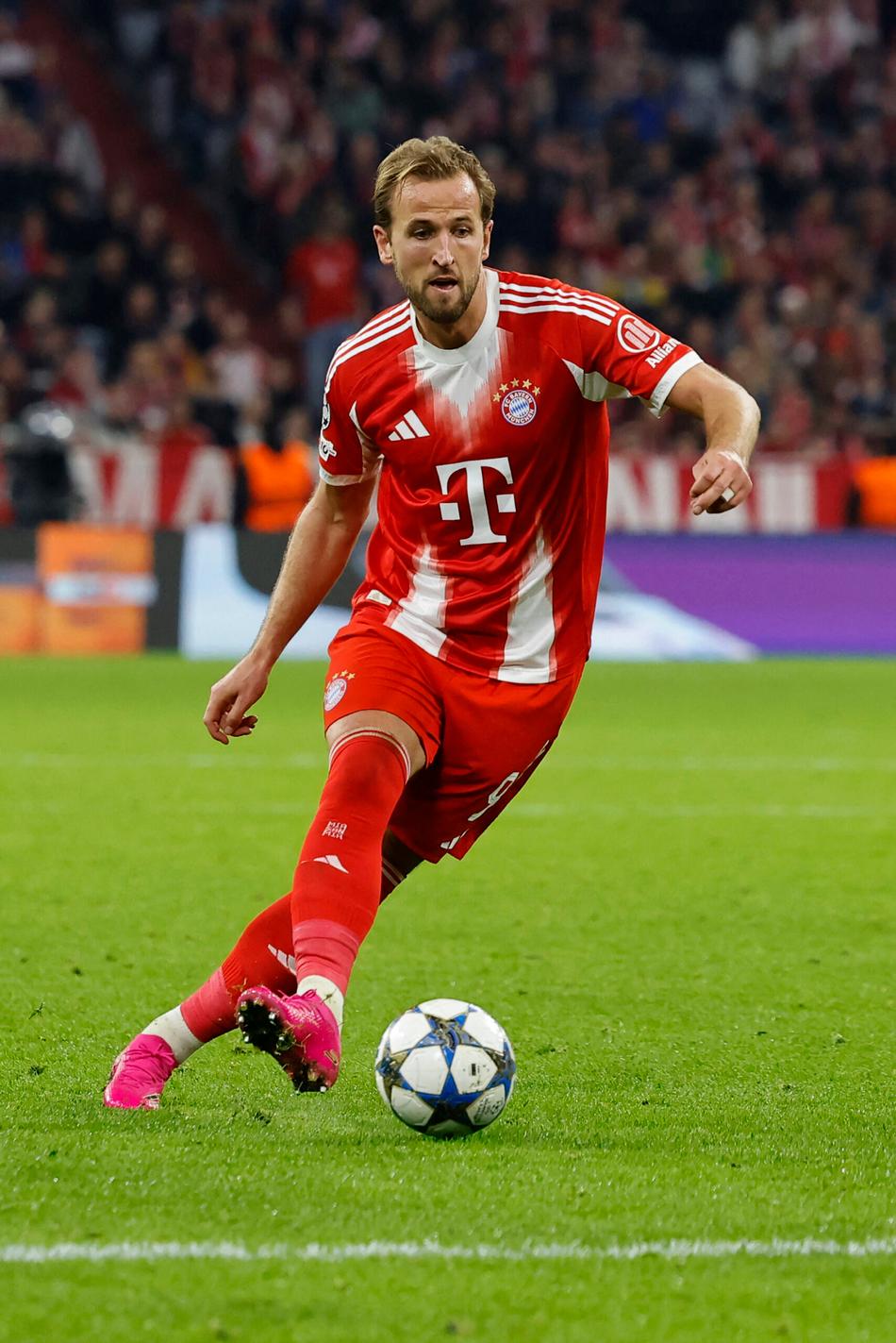 Harry Kane em ação na vitória do Bayern sobre o Club Brugge na Champions (Foto: Alexandra BEIER / AFP)