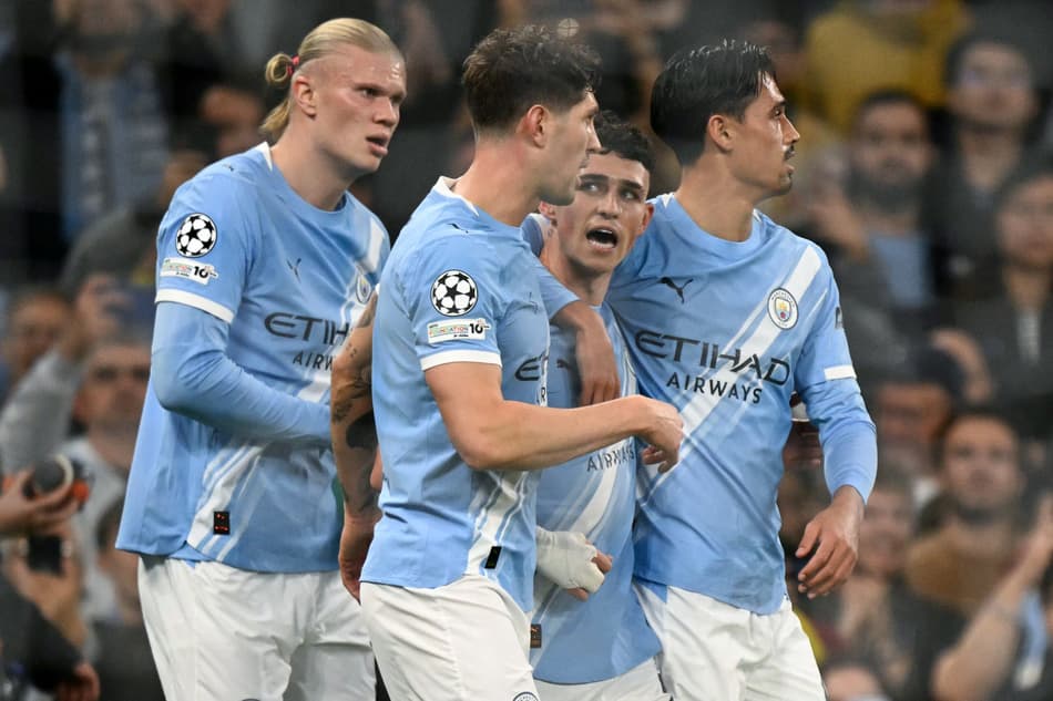 Pela Champions League, o Manchester City venceu o Borussia Dortmund por 4 a 1 (Foto: Oli SCARFF / AFP)