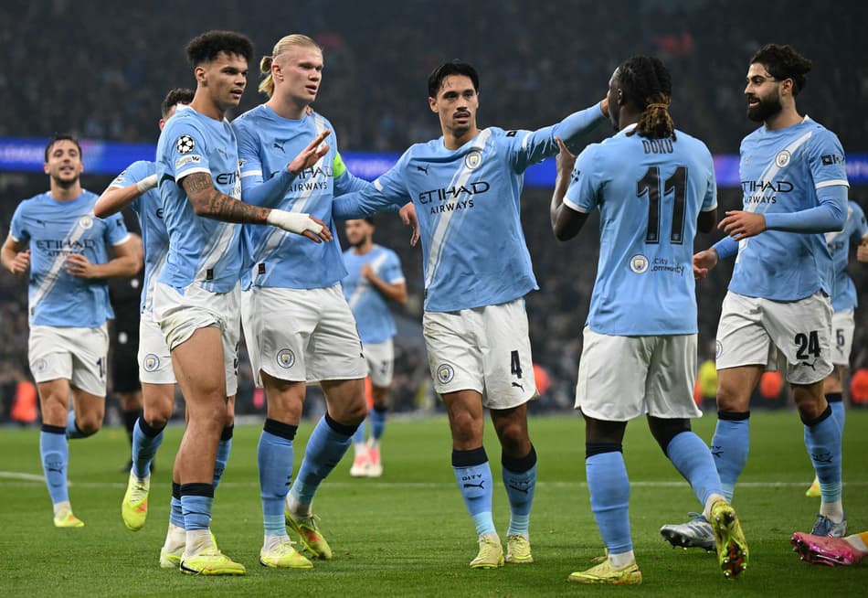 Pela Champions League, o Manchester City venceu o Borussia Dortmund por 4 a 1 (Foto: Oli SCARFF / AFP)