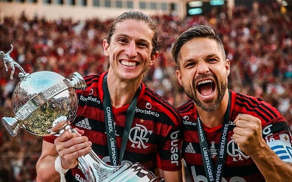 Filipe Luís e Diego Ribas comemorando a Libertadores (Foto: Reprodução)