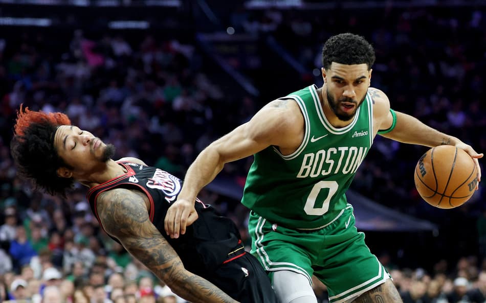 PHILADELPHIA, PENNSYLVANIA - APRIL 26: Jayson Tatum #0 of the Boston Celtics fouls Kelly Oubre Jr. #9 of the Philadelphia 76ers during the second half of game four of the Eastern Conference first round playoffs at Xfinity Mobile Arena on April 26, 2026 in Philadelphia, Pennsylvania. NOTE TO USER: User expressly acknowledges and agrees that, by downloading and or using this photograph, User is consenting to the terms and conditions of the Getty Images License Agreement. Emilee Chinn/Getty Images/AFP (Photo by Emilee Chinn / GETTY IMAGES NORTH AMERICA / Getty Images via AFP)