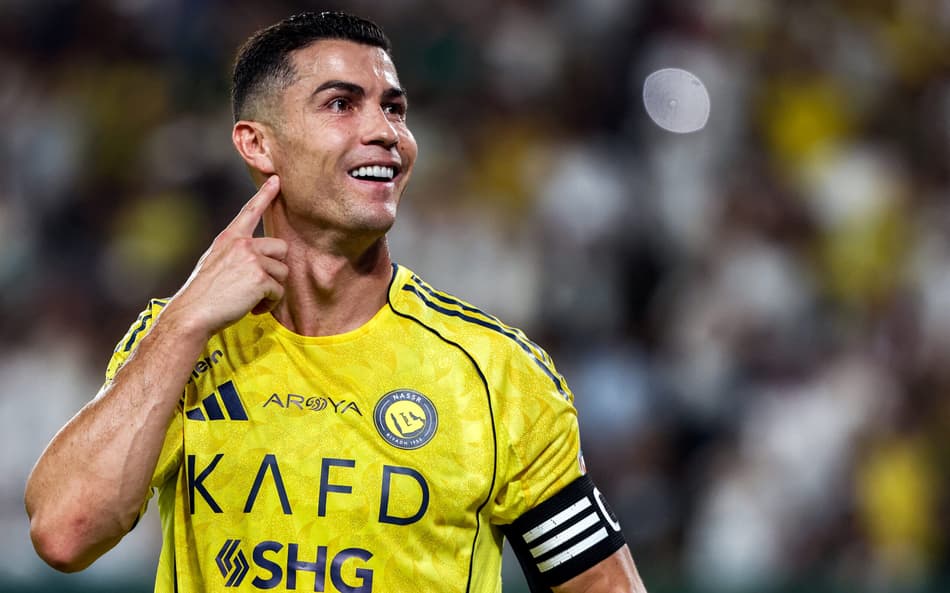 Cristiano Ronaldo comemorando o segundo gol marcado (Foto: Fayez Nureldine/AFP)