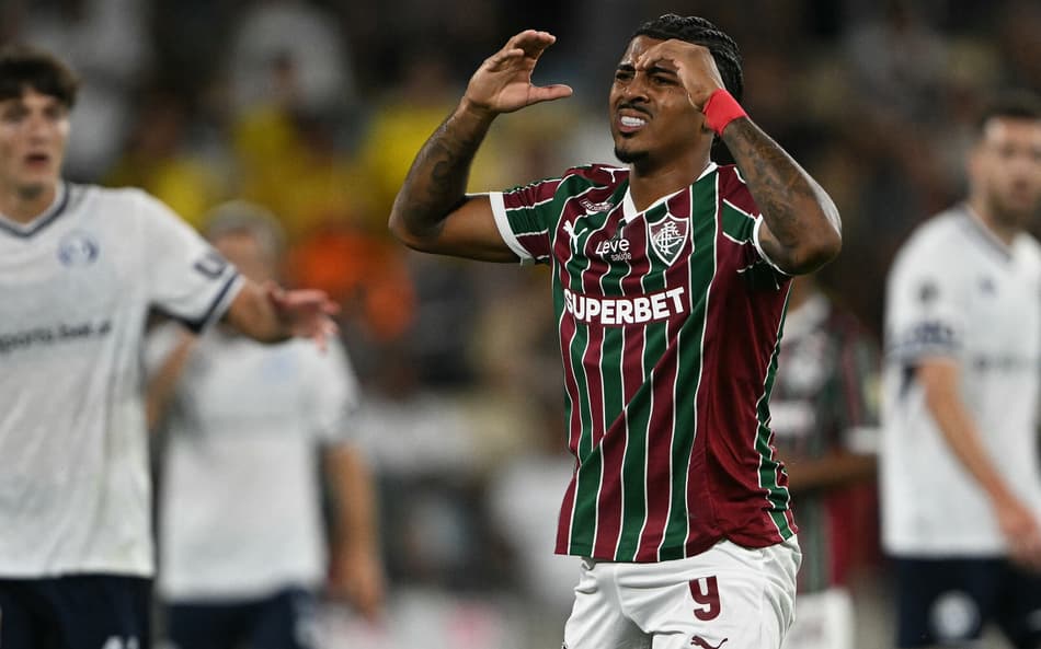 John Kenedy em Fluminense x Independiente Rivadavia (Foto: MAURO PIMENTEL / AFP)