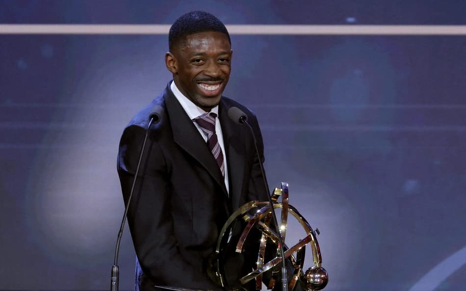 Paris Saint-Germain's French forward #10 Ousmane Dembele receives the Ligue 1 best player award during the 34th UNFP's (France's professional players union) French football awards ceremony in Paris on May 11, 2026. (Photo by Thomas SAMSON / AFP)
