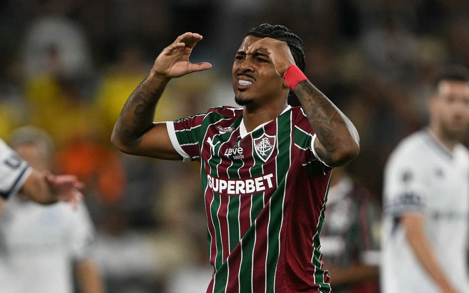 John Kenedy em Fluminense x Independiente Rivadavia (Foto: MAURO PIMENTEL / AFP)