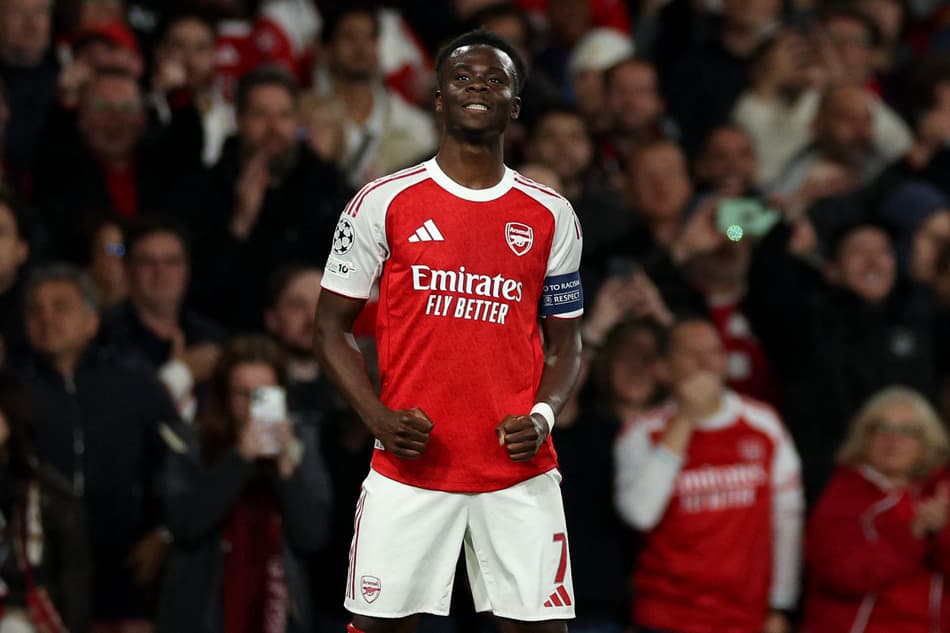 Saka comemora gol marcado pelo Arsenal sobre o Atlético de Madrid, pela Champions League