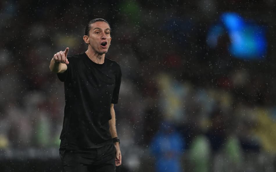 Ex-jogador conquistou cinco títulos relevantes pelo Flamengo como técnico (Foto: MAURO PIMENTEL / AFP)