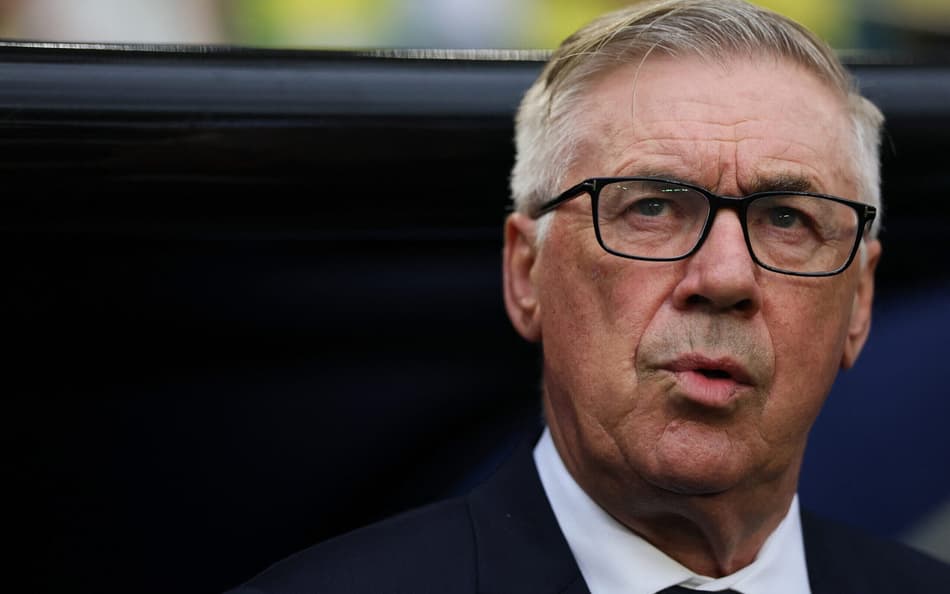 Ancelotti na partida entre Brasil e Escócia pela Copa do Mundo (Foto: PATRICIA DE MELO MOREIRA / AFP)