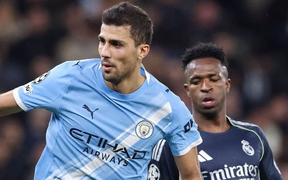 Rodri e Vini Jr em ação no duelo entre Real Madrid x Manchester City (Foto: Reprodução/X)