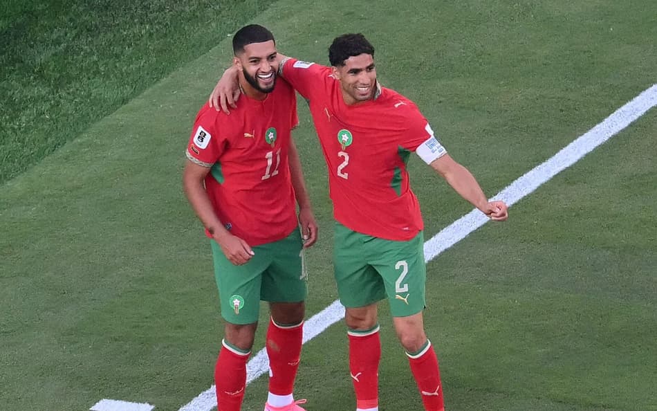 smael Saibari comemora o primeiro gol de sua equipe com chraf Hakimi, durante a partida de futebol do Grupo C da Copa do Mundo de 2026 entre Brasil e Marrocos, no Estádio Nova York/Nova Jersey.