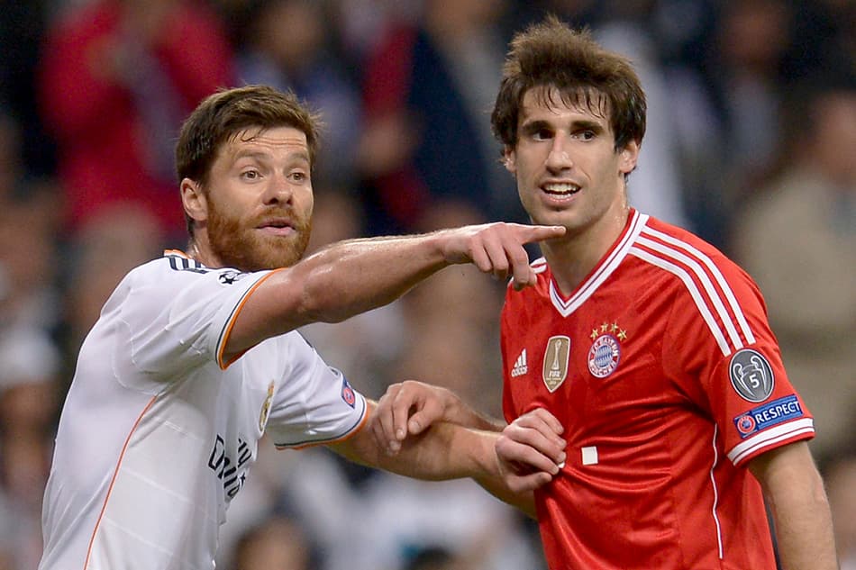 Real Madrid x Bayern de Munique - Xabi Alonso e Javi Martinez (Foto: Dani Pozo/AFP)