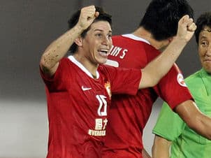 Conca atuou com Muriqui na China (Foto: AFP)