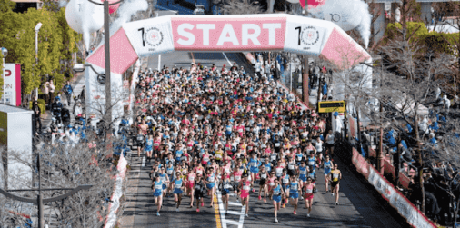 Maratona Campeã. Atleta Mulher Corredor. Competição Desportiva